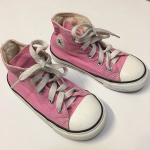 Converse high top pink shoes
